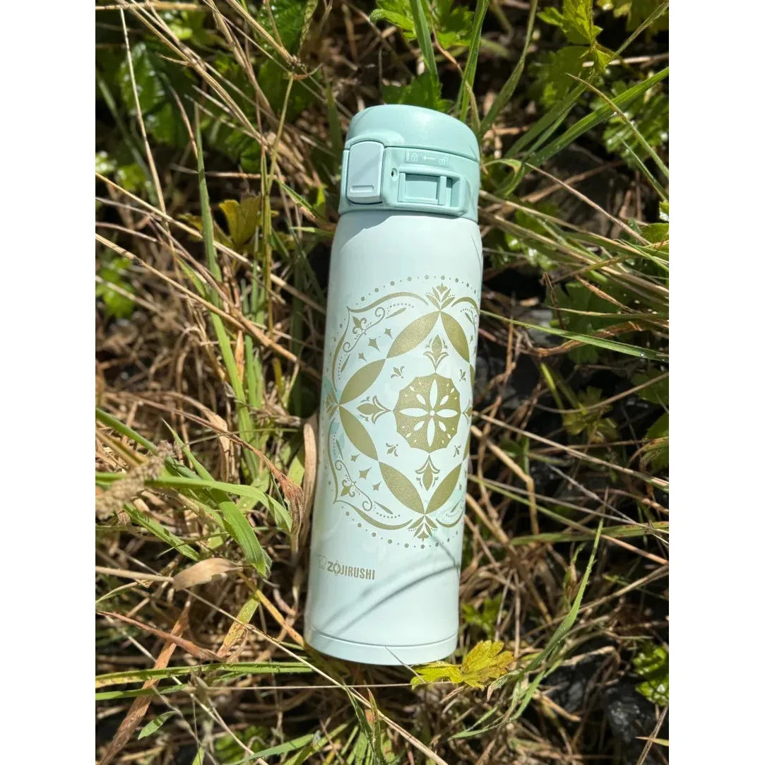 Zojirushi SM-SG48 Mint travel mug stainless steel insulated bottle on grass in Ireland