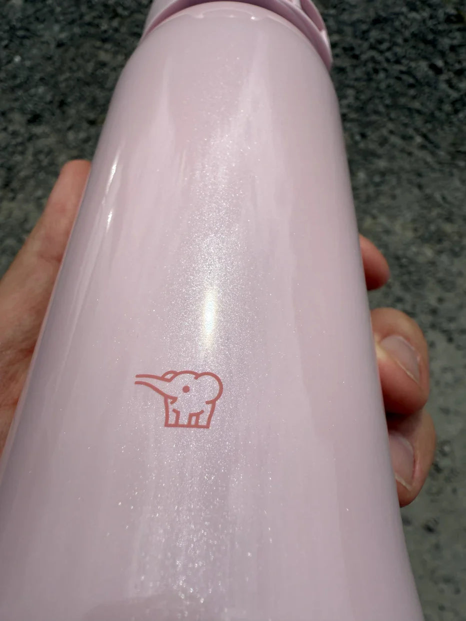 Zojirushi SM-SR pink insulated travel mug lifestyle outdoor shot in Ireland