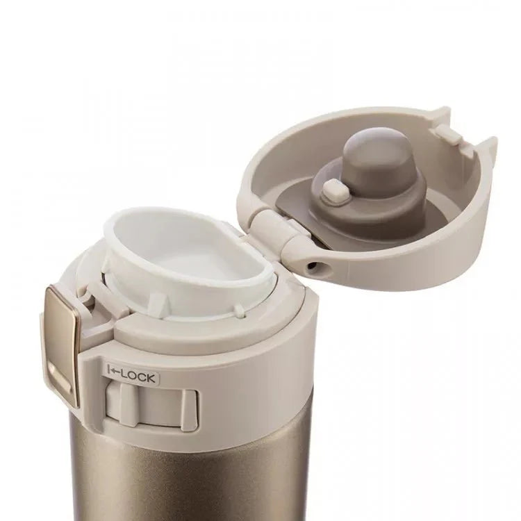 Zojirushi SM-KHE48 gold travel mug open lid showing leak proof and easy clean design