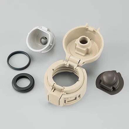 Zojirushi SM-PD beige travel mug disassembled lid with gasket and parts for cleaning