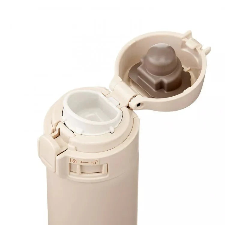 Zojirushi SM-PD beige travel mug open lid showing leak proof vacuum insulation design