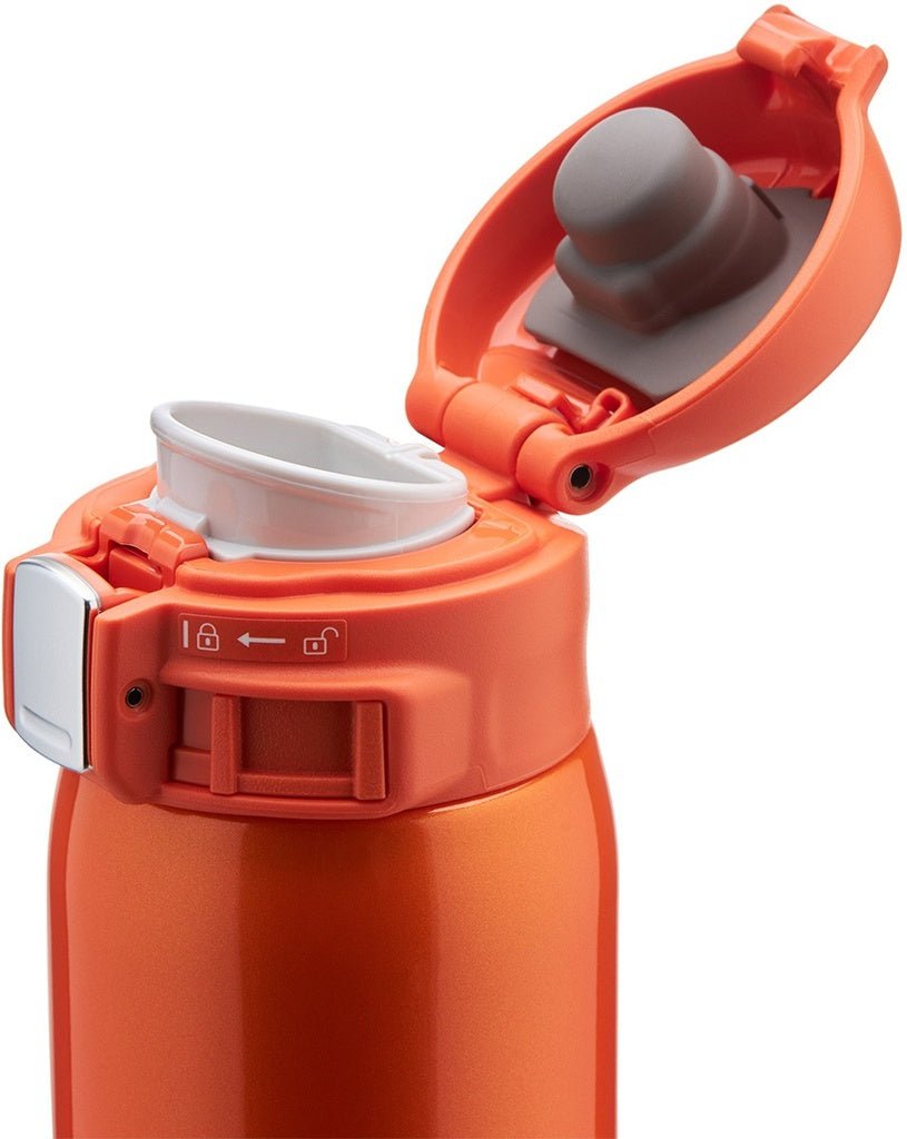 Open lid of Zojirushi SM-SHE orange travel mug showing hygienic stainless steel interior