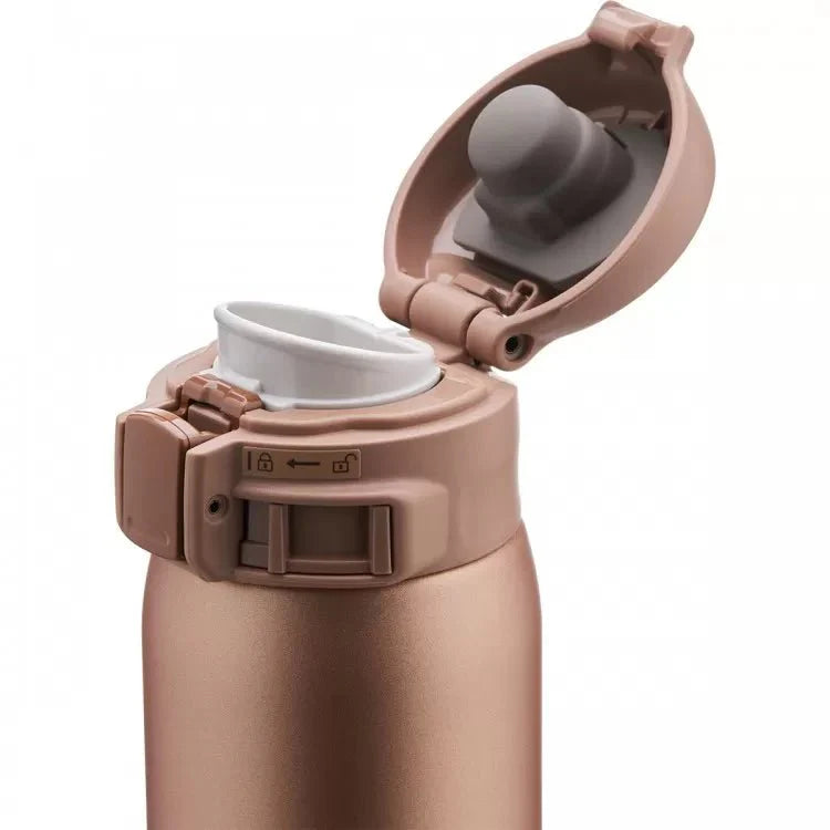 Zojirushi SM-SR series brown insulated travel mug open lid showing spout and interior